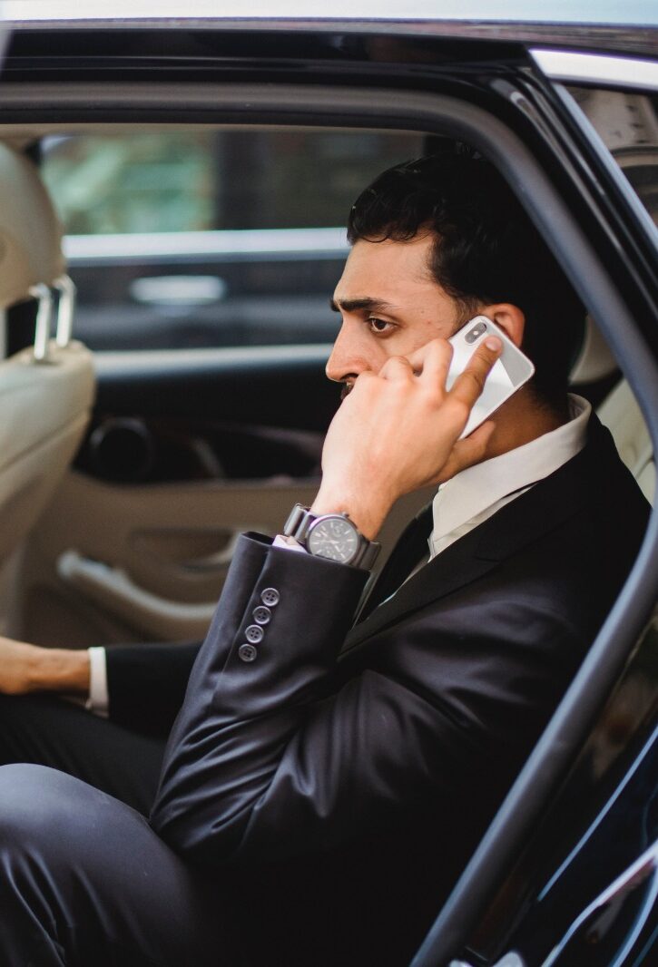 Passenger Making a Call in Our Corporate Sedan