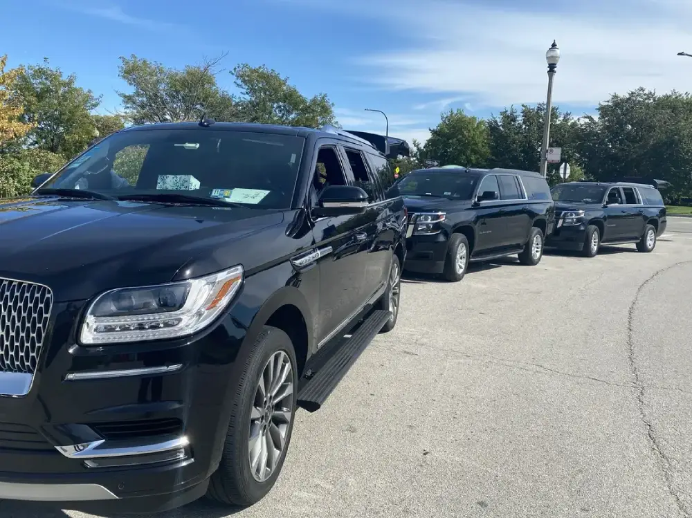3 black SUVs in a row