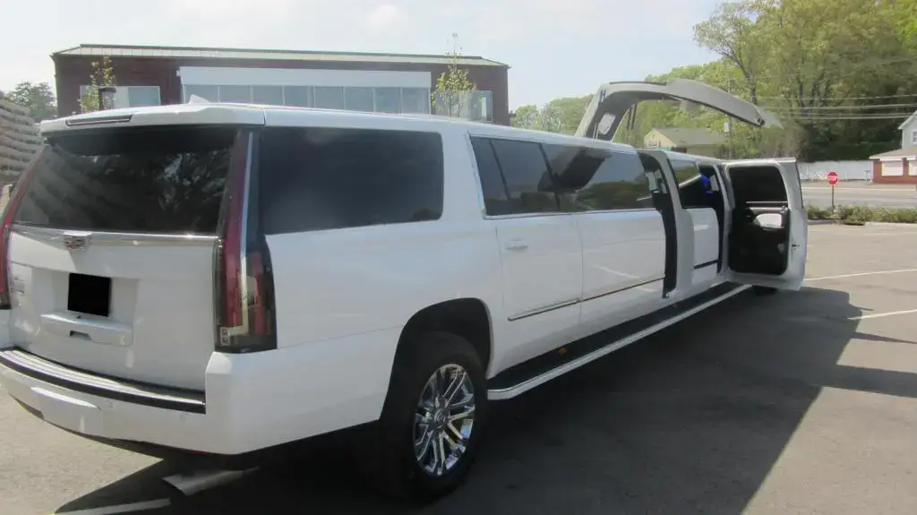 White SUV Limo back view parked - Limo Service Arcadia